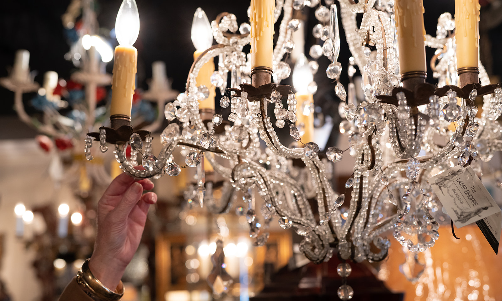 Antique chandeliers in crystal, bead, glass, wood and iron. The showroom has chandeliers for any style you choose, from elaborate and ornate to simple and stunning