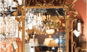 The Lamp Shoppe Atlanta has beautiful mirrors in silver and wood, silver-plated dinner settings, ornaments including Wedgewood, and more.